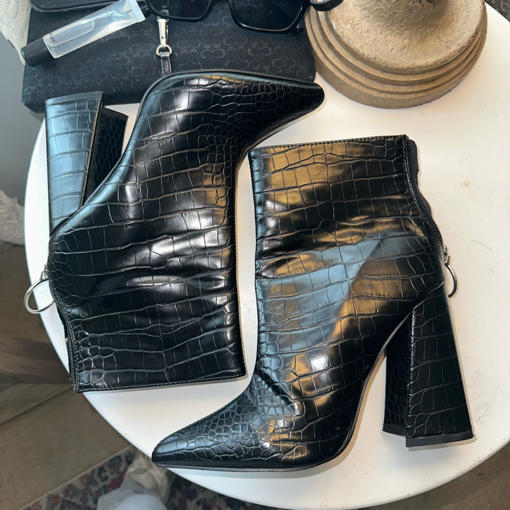 Black snakeskin heel booties